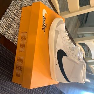 Nike white with black swish high tops